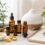 Essential oils beginner safety setup with diffuser lavender carrier oil and notebook