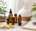 Essential oils beginner safety setup with diffuser lavender carrier oil and notebook