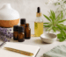 Essential oil bottles diffuser herbs and carrier oil for safe aromatherapy use