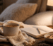 Evening routine with herbal tea journal blanket and warm bedside light